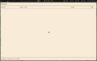 MPD + ncmpcpp (daemon + client), running on Copal
